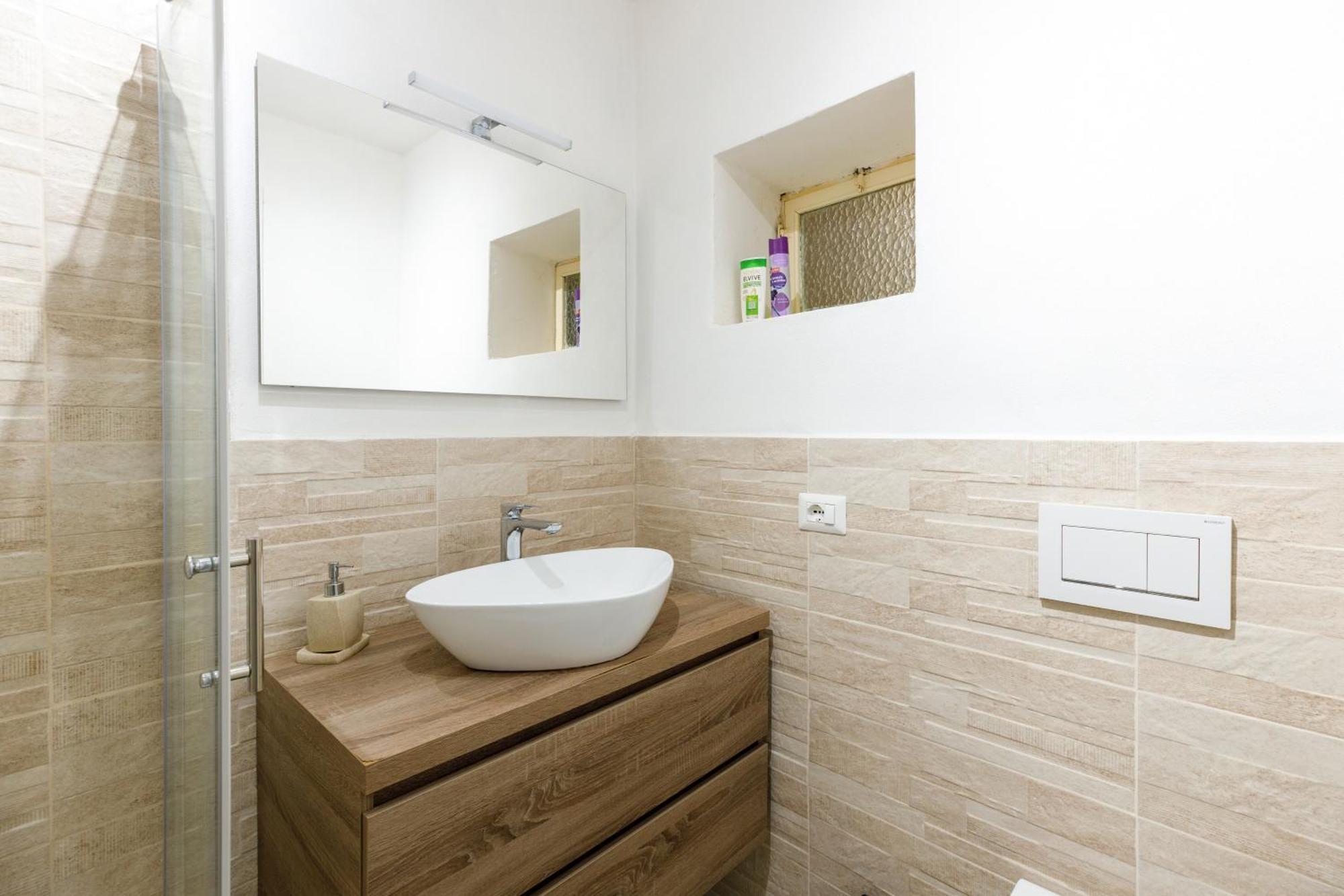 Casa Rocca Apartment Bosa Bagian luar foto