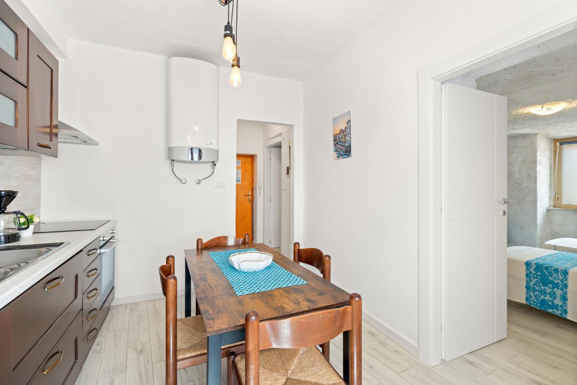 Casa Rocca Apartment Bosa Bagian luar foto