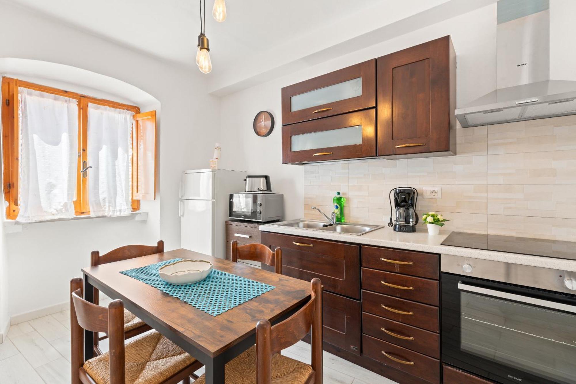 Casa Rocca Apartment Bosa Bagian luar foto